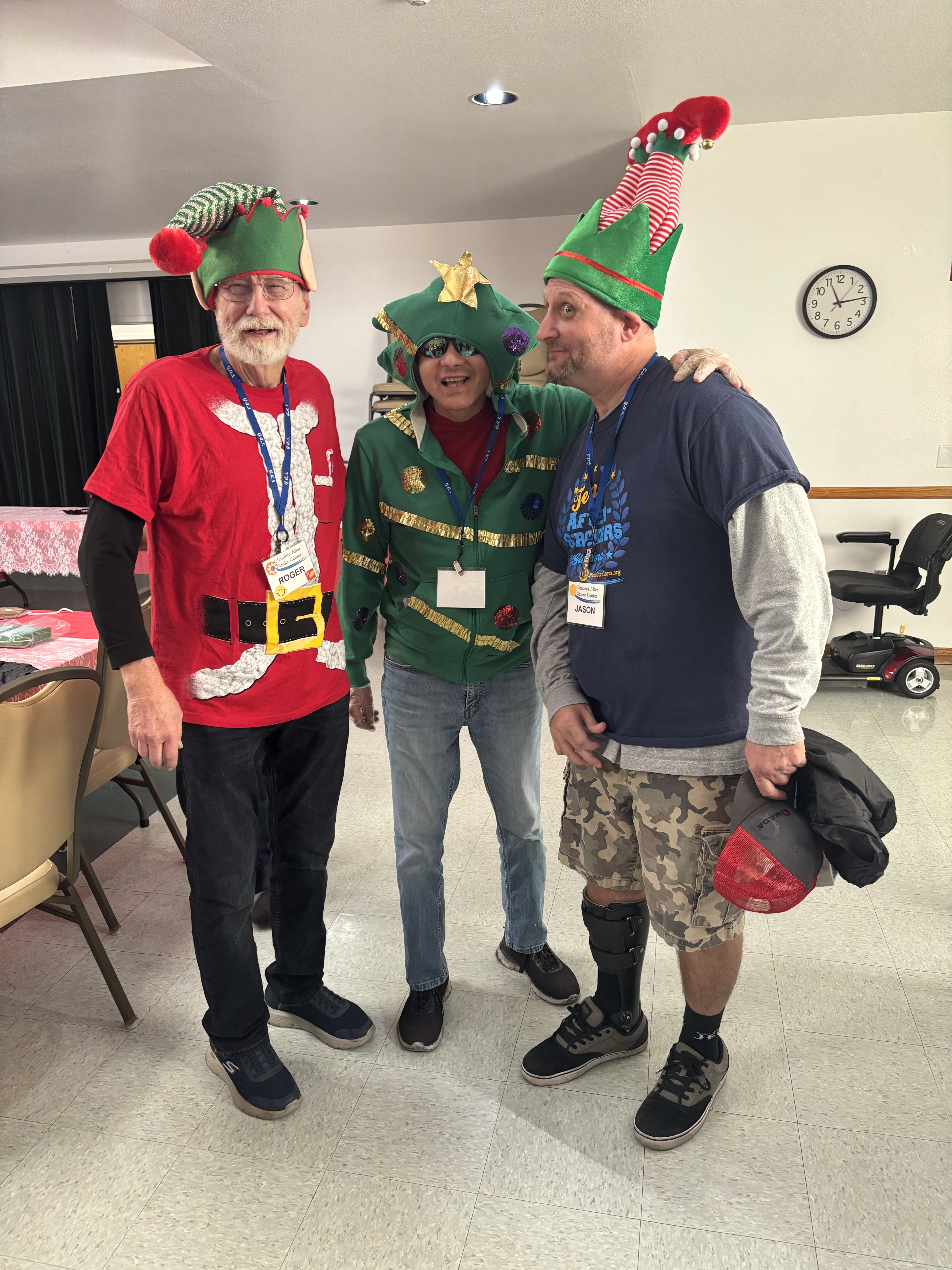 Roger, Jaime, and Jason in their Christmas finery